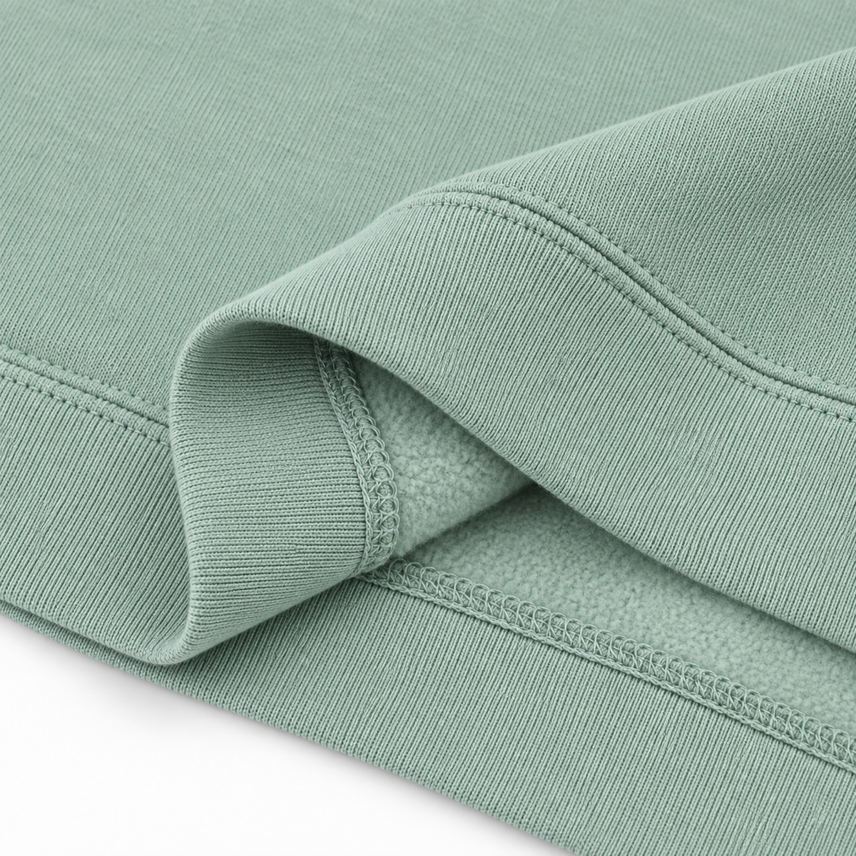 Detalle del tejido y acabado de la sudadera TUNA FRUTTI en color Sage